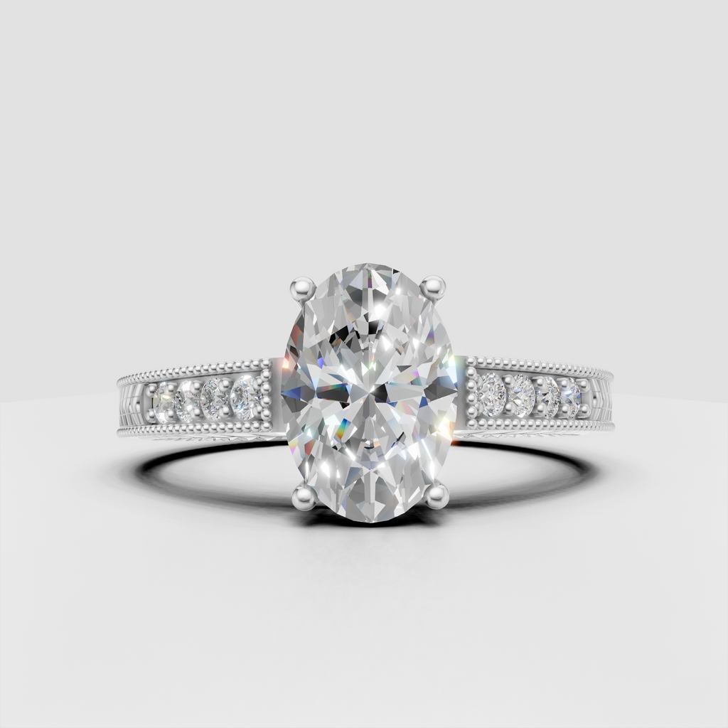 Oval diamond engagement ring with beaded milgrain borders and sculpted band