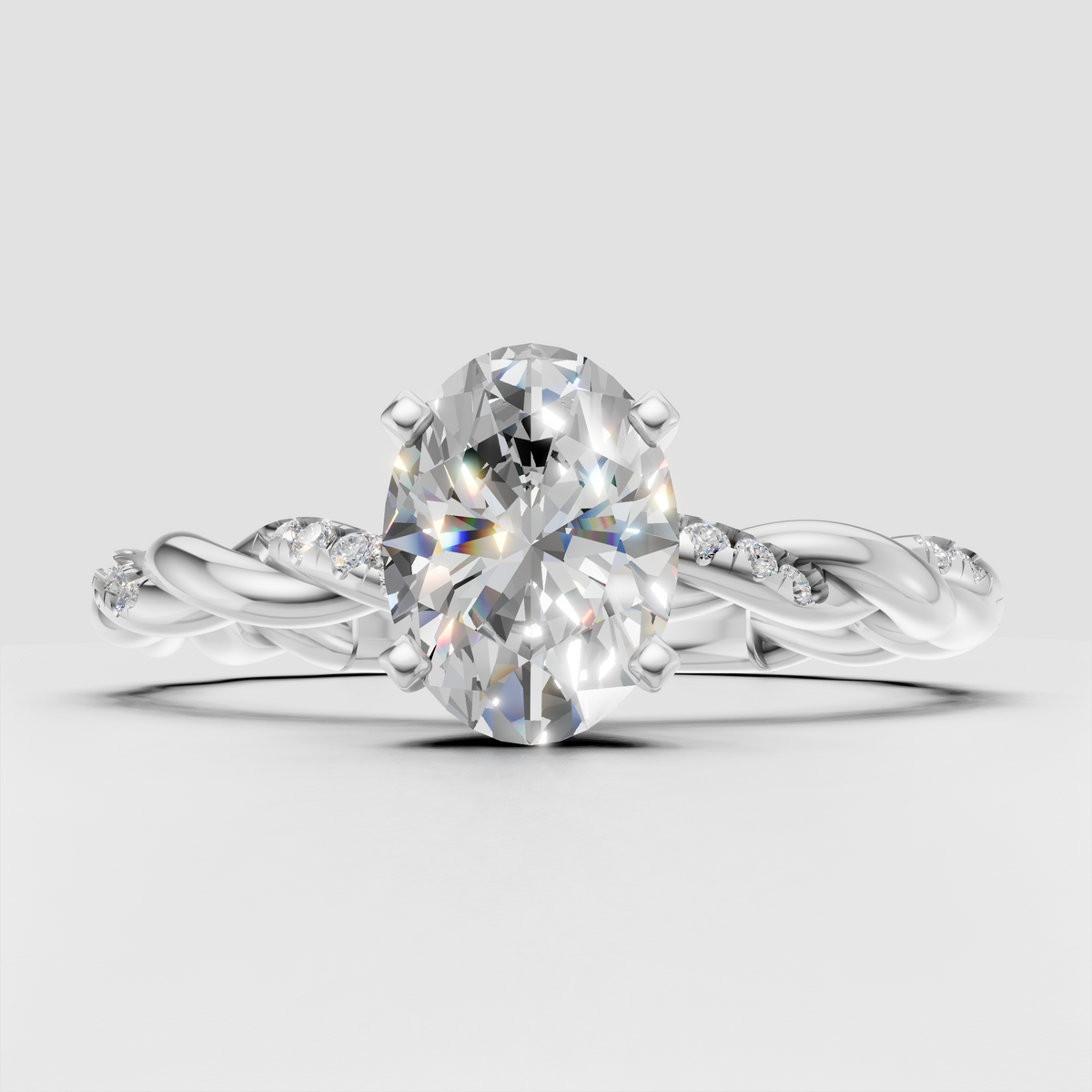Oval center diamond with round accent diamonds