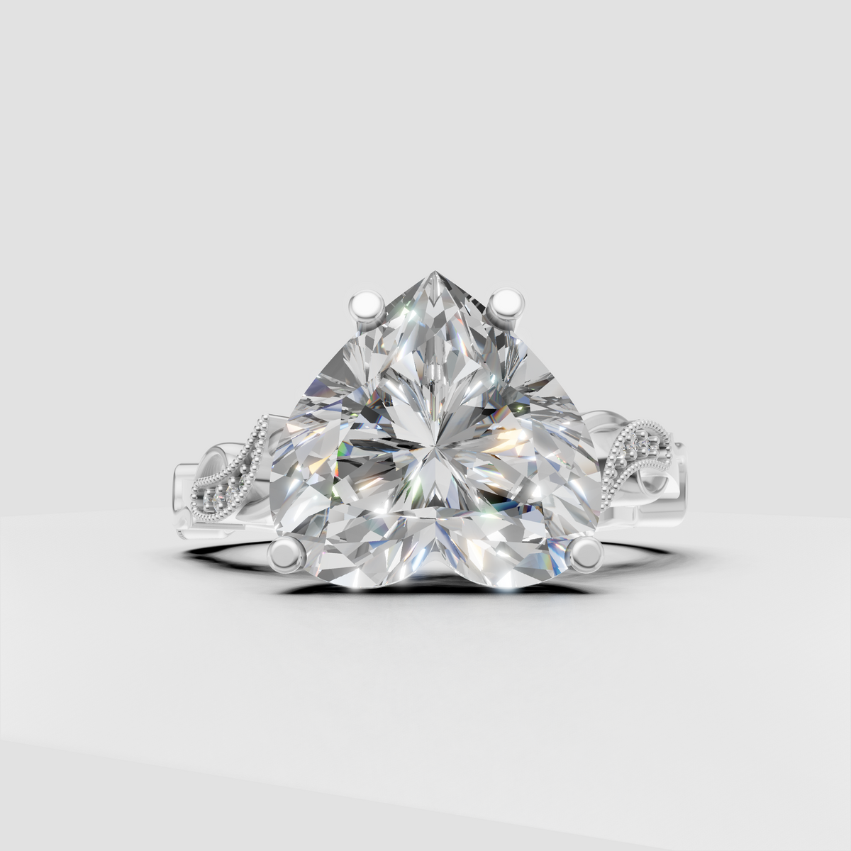 Gold heart cut diamond engagement ring with sculpted split shank