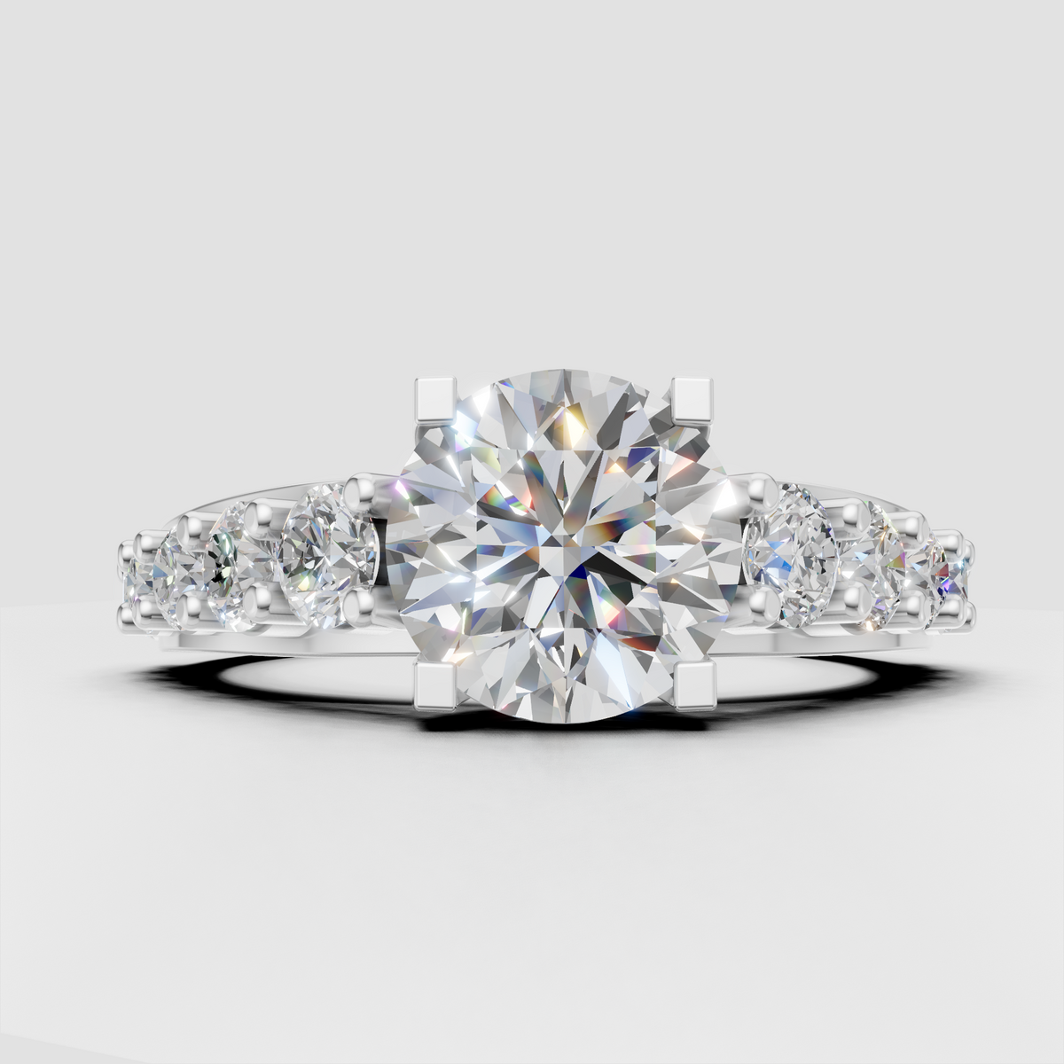 Glamorous round cut engagement ring with pave diamond sides