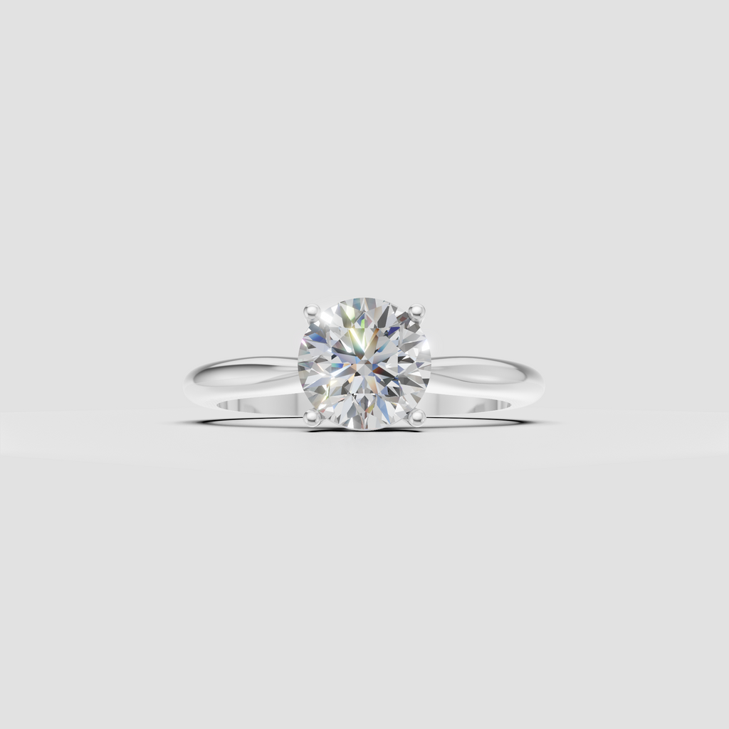 Round brilliant diamond secured in a classic four prong solitaire setting