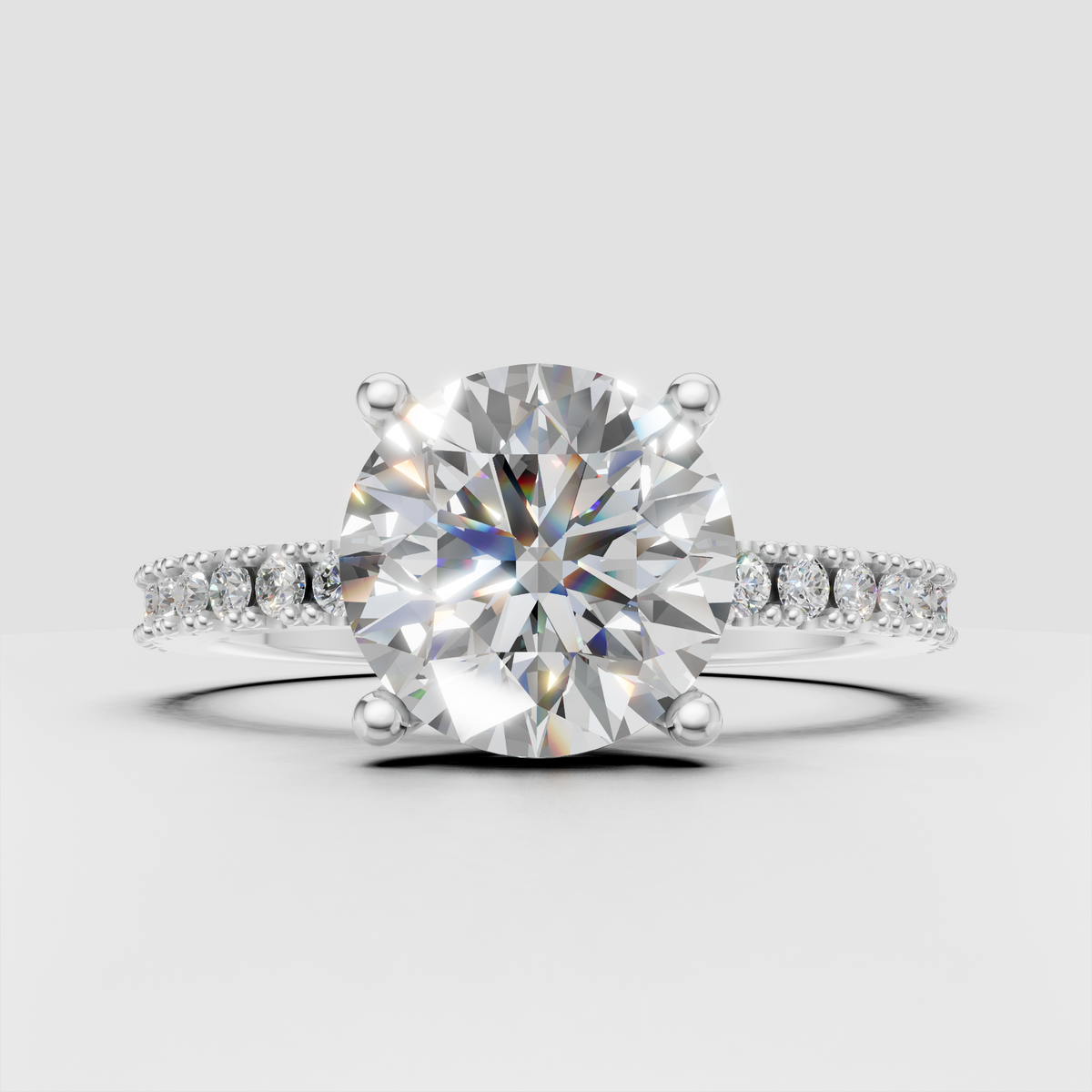 Yellow gold round engagement ring with intricate milgrain accentsund