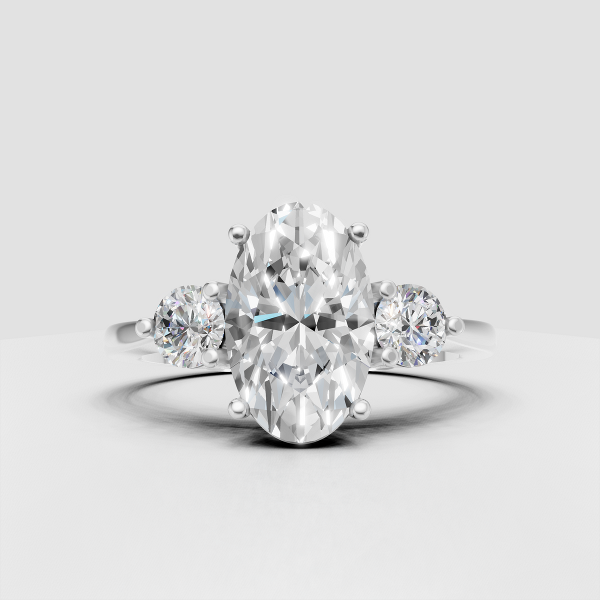 Three stone oval diamond engagement ring for her