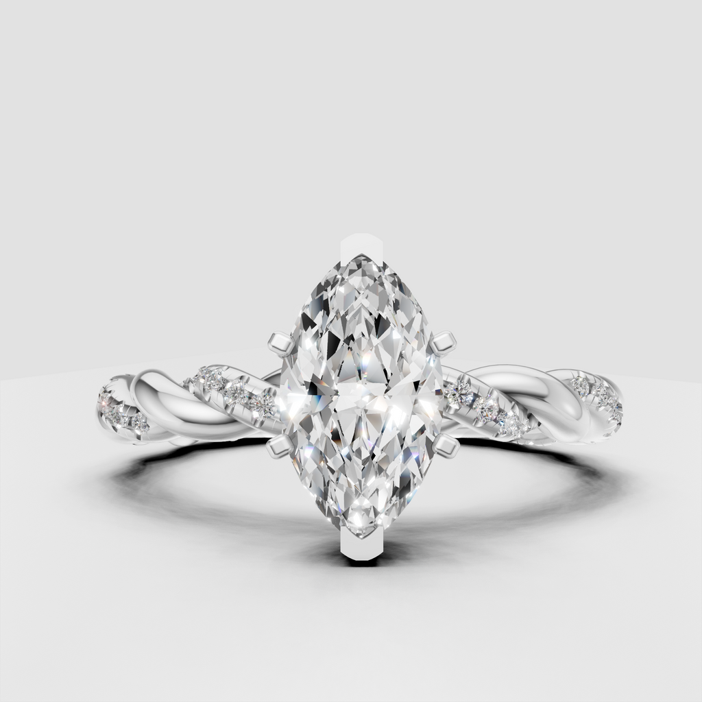 Romantic marquise diamond engagement ring in polished yellow gold