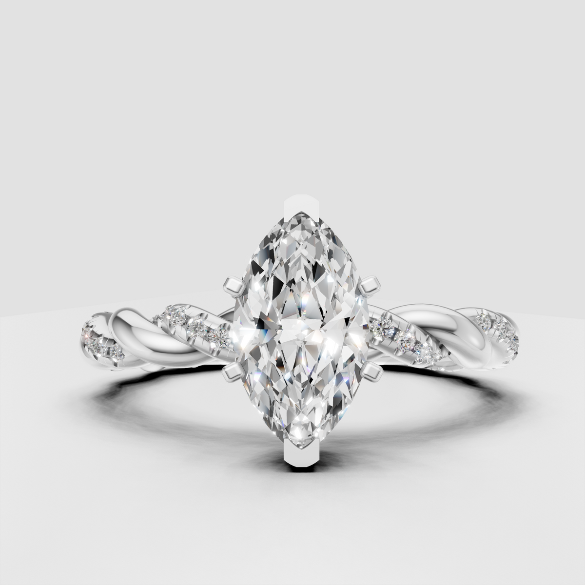 Romantic marquise diamond engagement ring in polished yellow gold