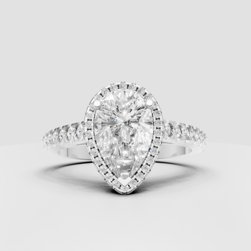 Pear cut diamond ring featuring a full halo of round accent stones