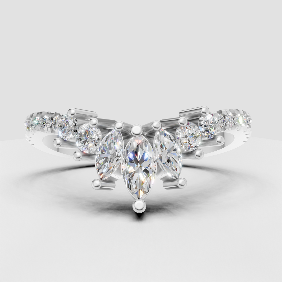 Marquise cut diamond band with round accents