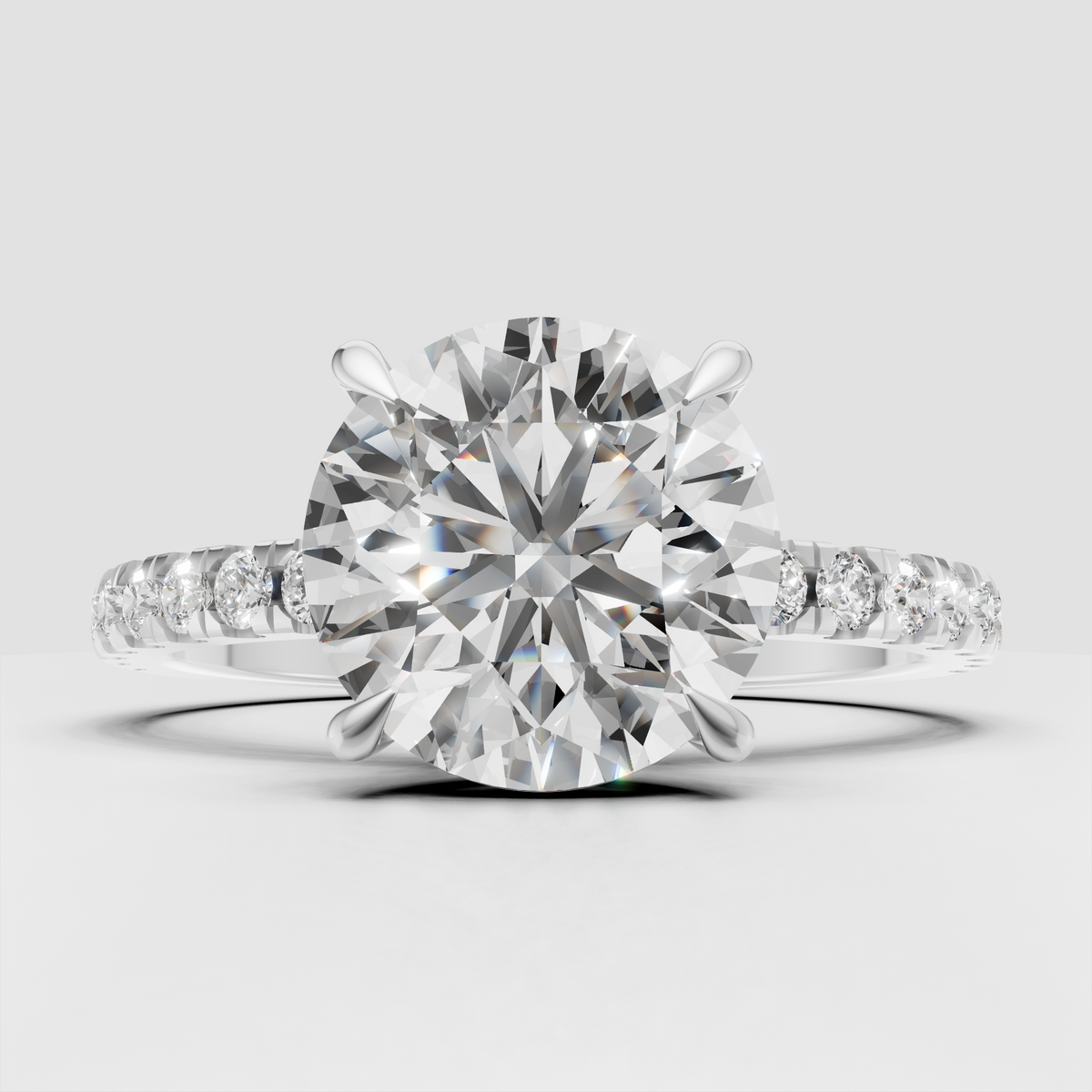 Yellow gold engagement ring with pavé diamonds