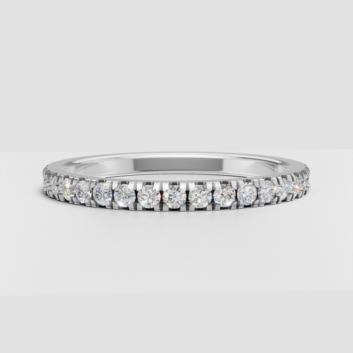 Continuous round diamond band with secure prongs
