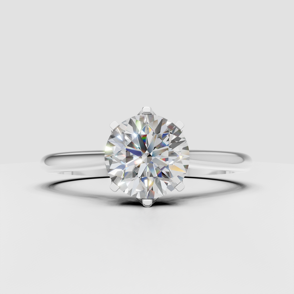 Elegant round cut diamond ring with sculpted gallery