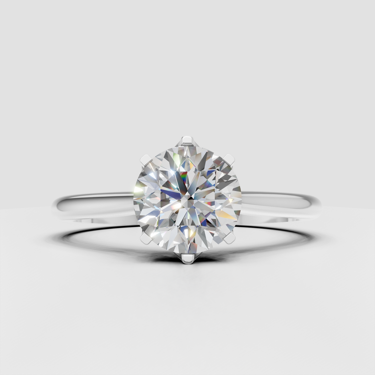 Elegant round cut diamond ring with sculpted gallery