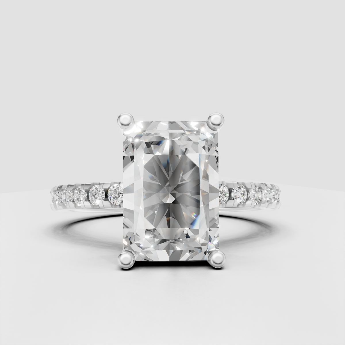 Modern radiant diamond engagement ring with hidden halo detail