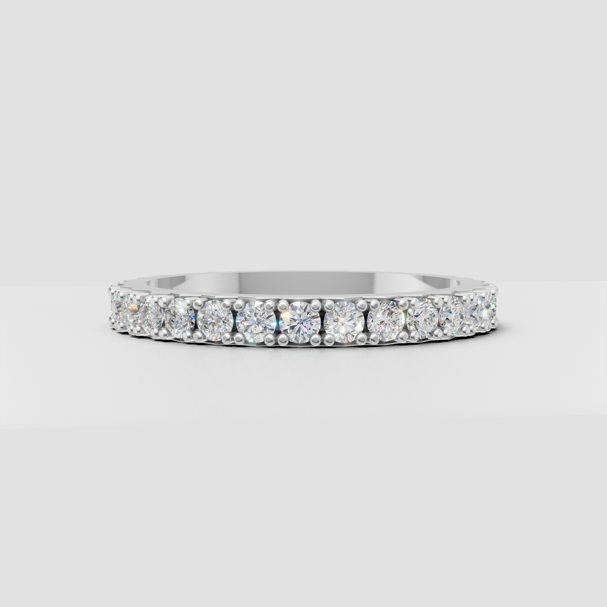 Round cut diamond band with vintage milgrain-inspired design