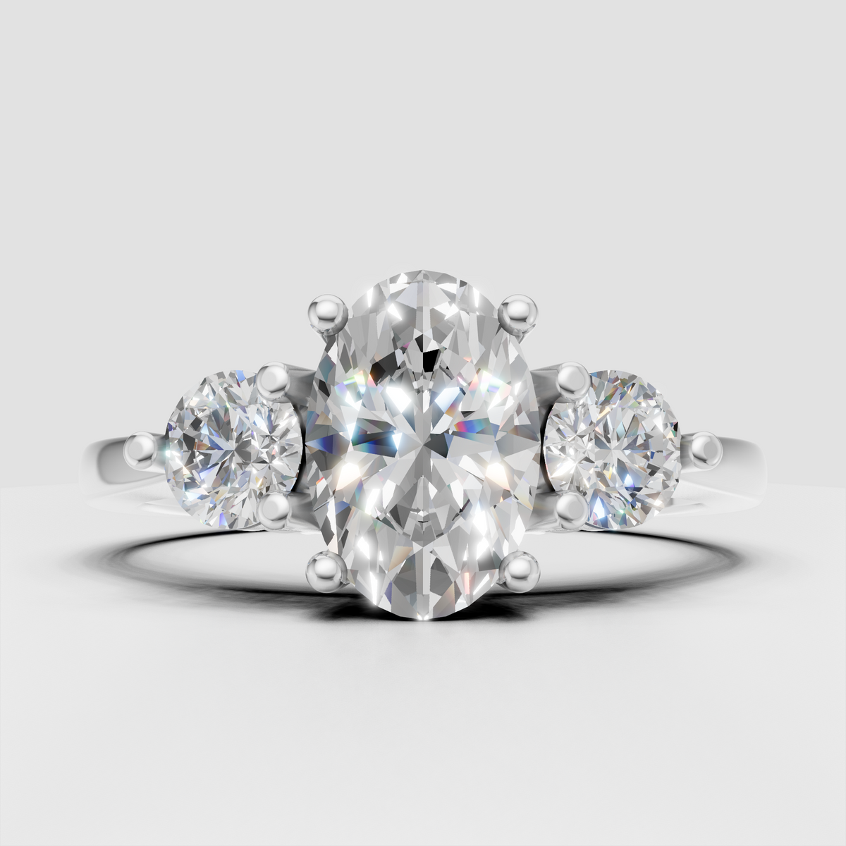 Oval center stone engagement ring with prong setting