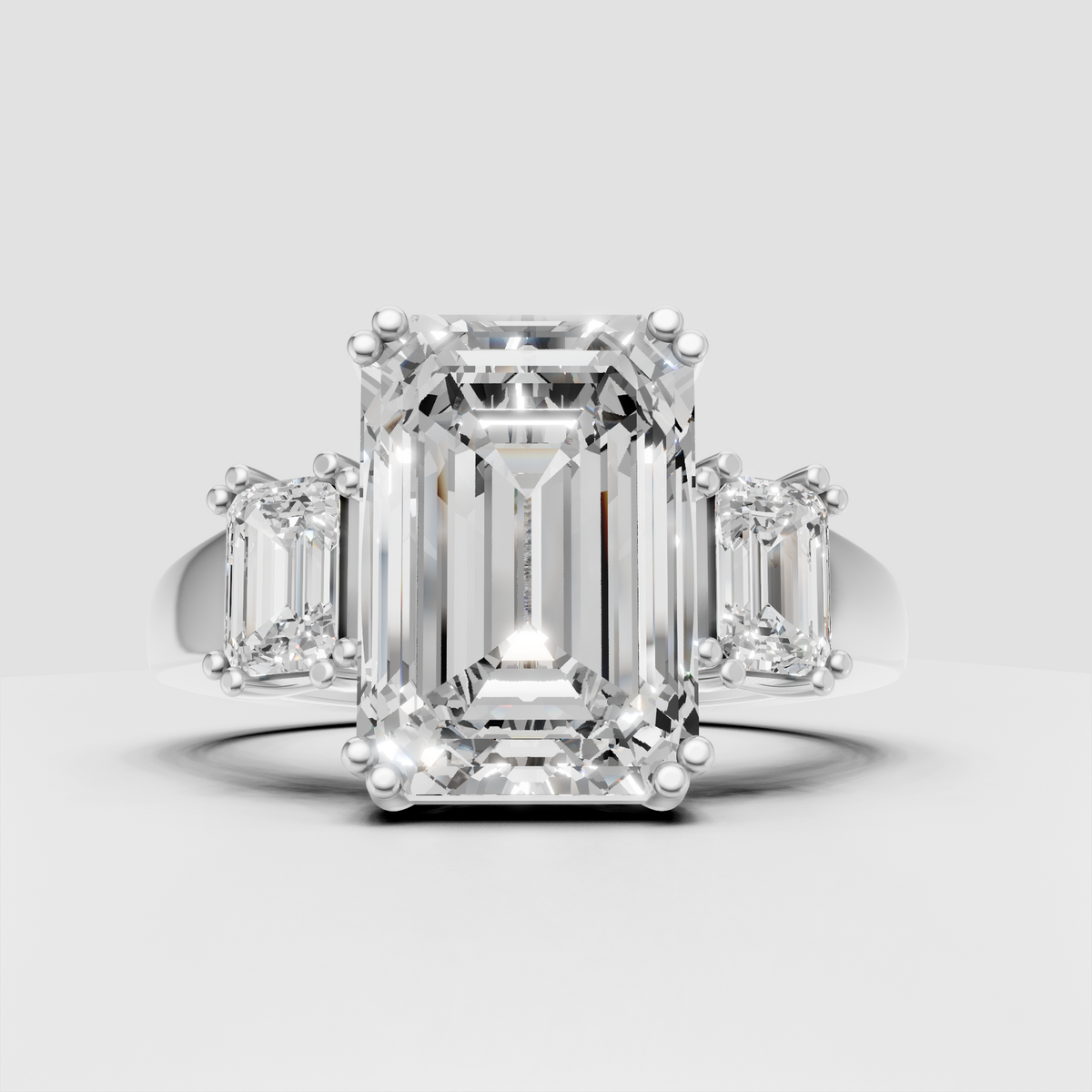 Emerald cut diamond ring with sculptural prong setting