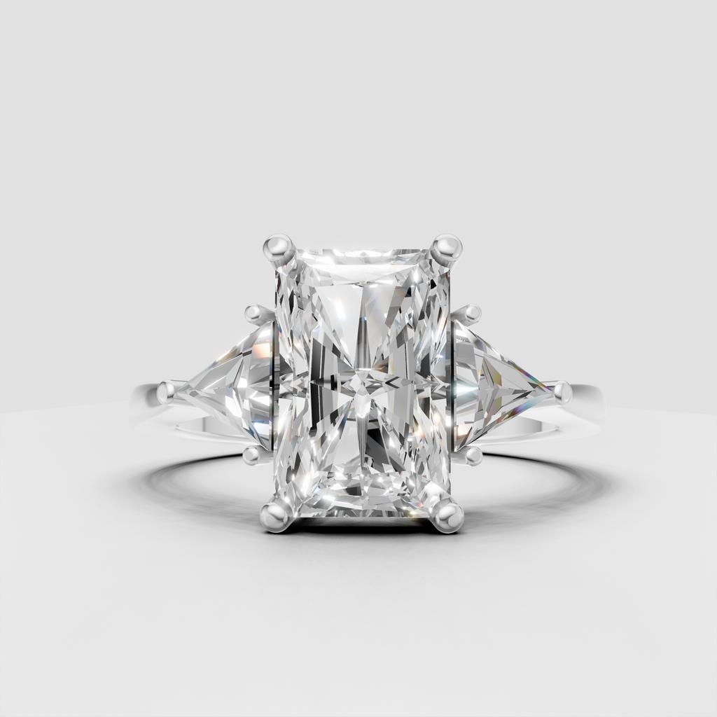 Luxury radiant diamond engagement ring with sculptural prongs and yellow gold band