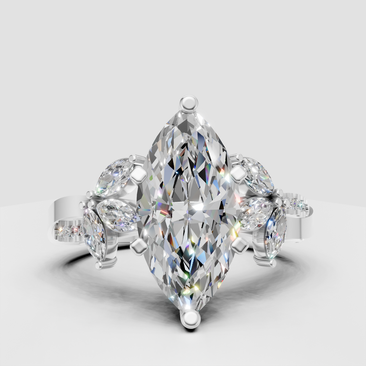 Marquise diamond ring featuring botanical-inspired side stones