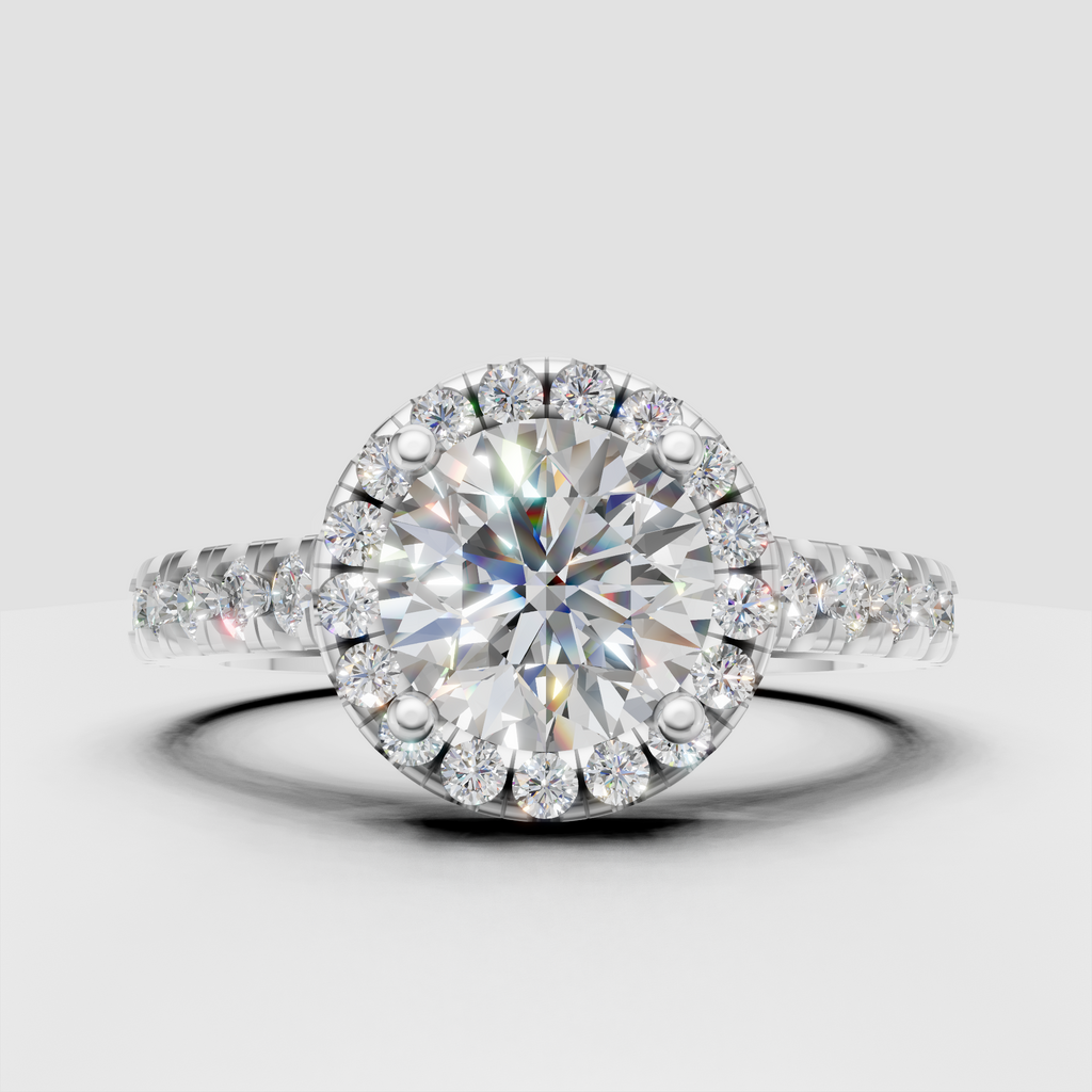 Round diamond halo ring featuring pavé-set shoulders