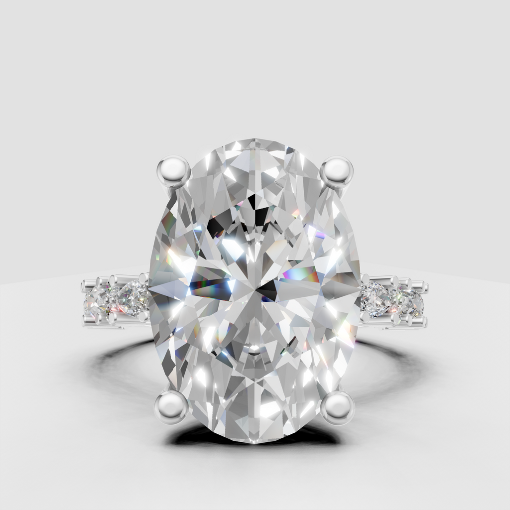 Elegant oval diamond engagement ring with intricate yellow gold band