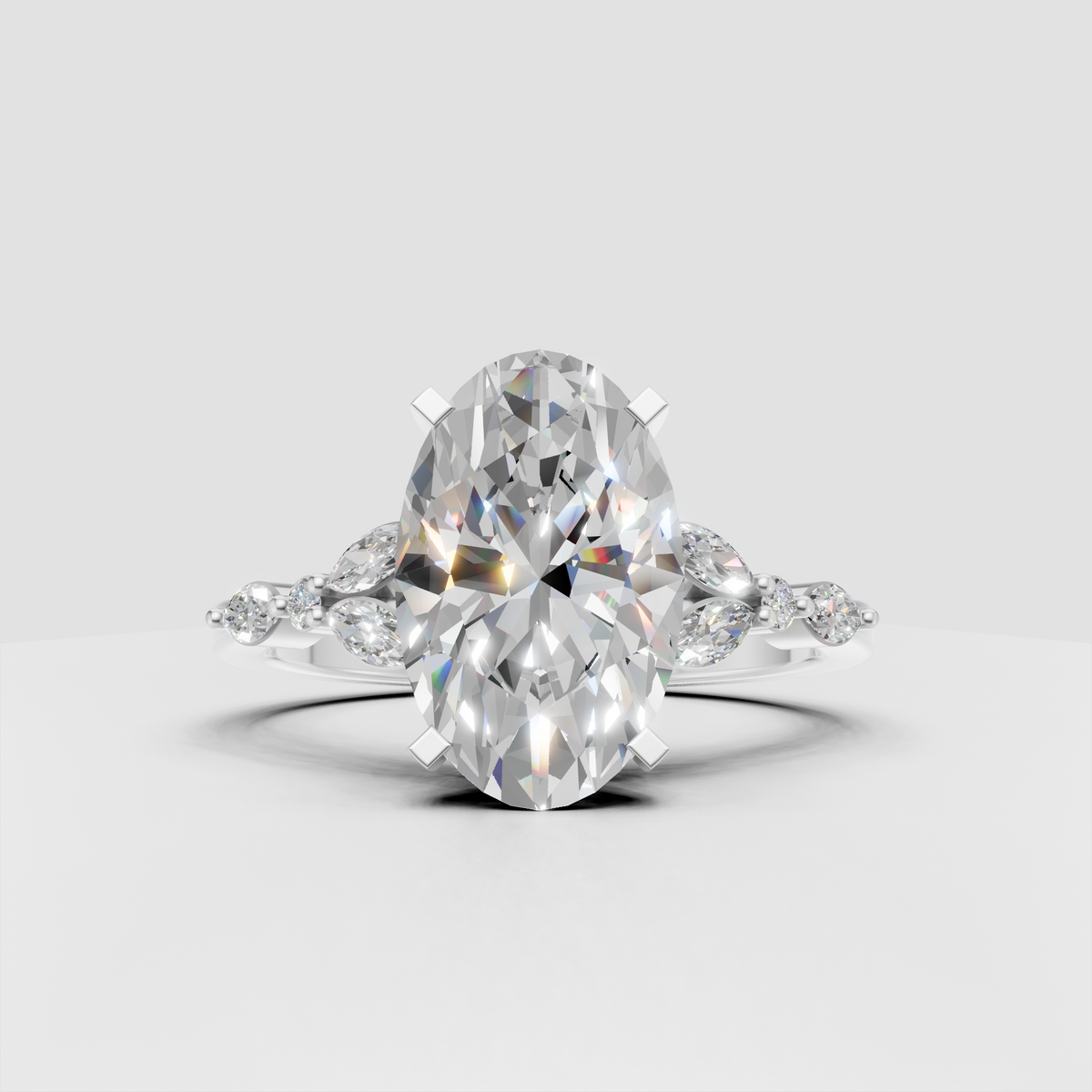 Oval diamond engagement ring with geometric side stones