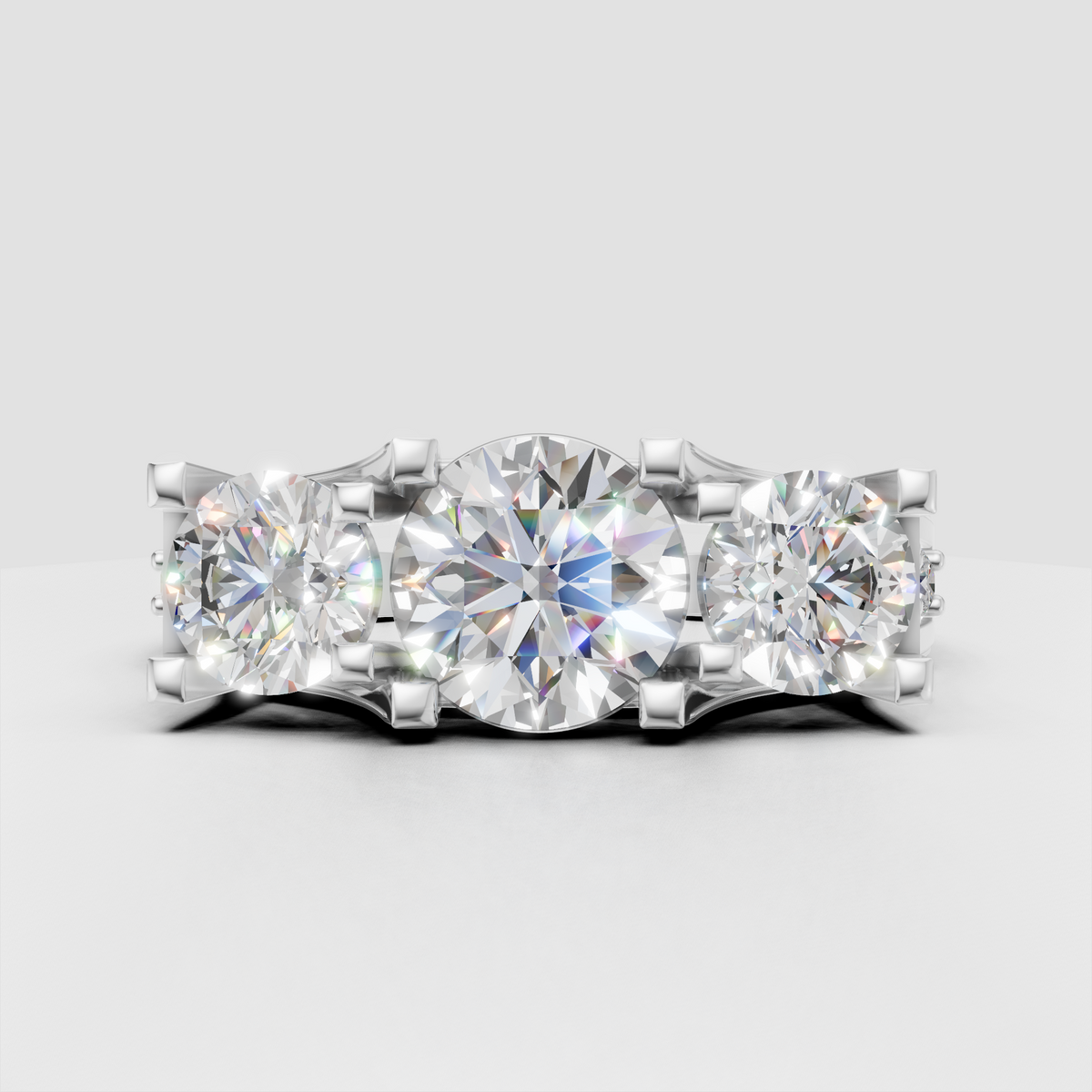 Round brilliant canter diamond engagement ring with two side diamonds