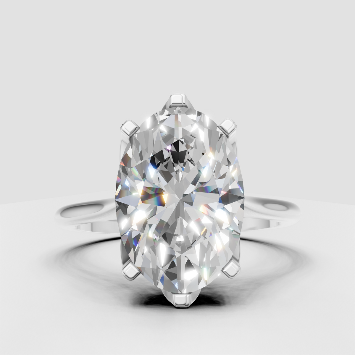 Oval diamond ring with sculpted prongs
