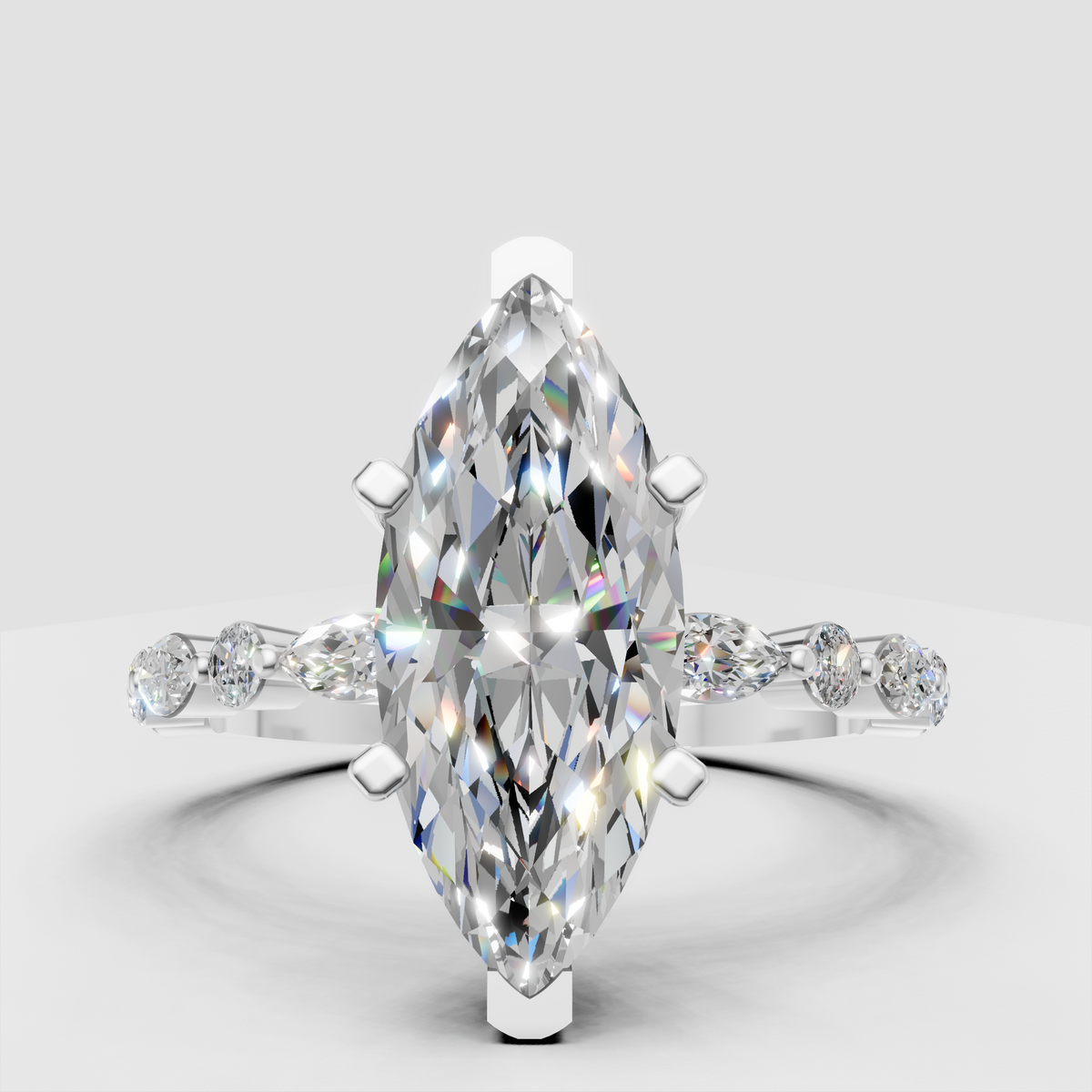 Modern marquise diamond engagement ring with curved shoulders and sparkling accents.