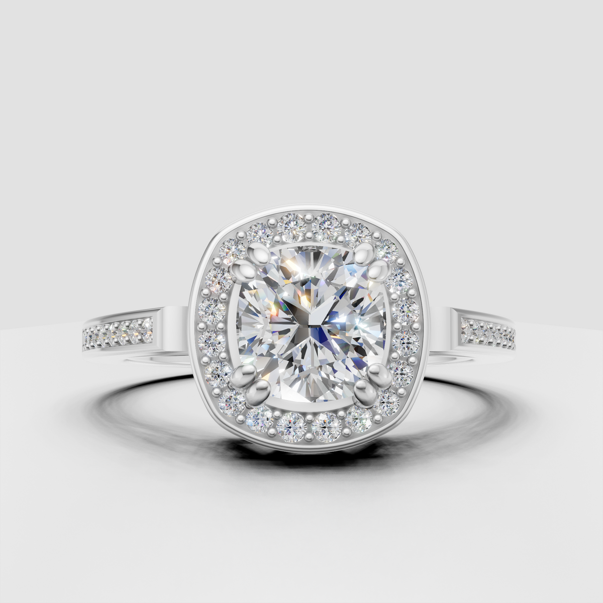 Pavé cushion halo engagement ring yellow gold