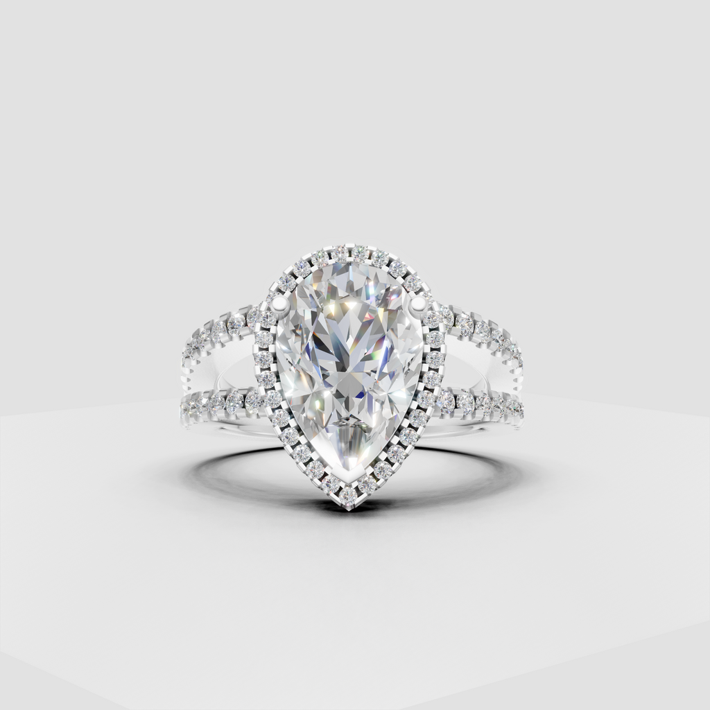 Pear shaped center diamond surrounded by a sparkling halo