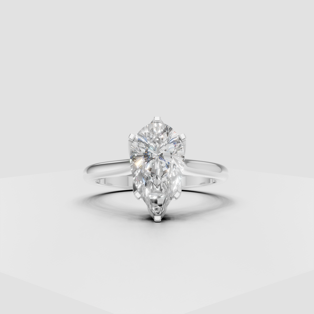 Classic pear cut diamond engagement ring with smooth gold band