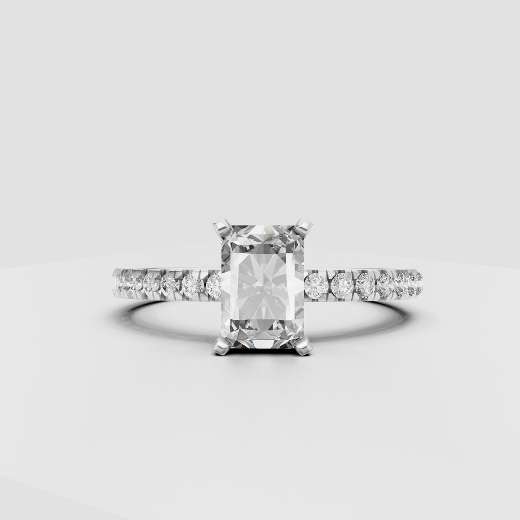 Radiant-cut center Diamond ring with four-prong solitaire setting and pavé shoulders