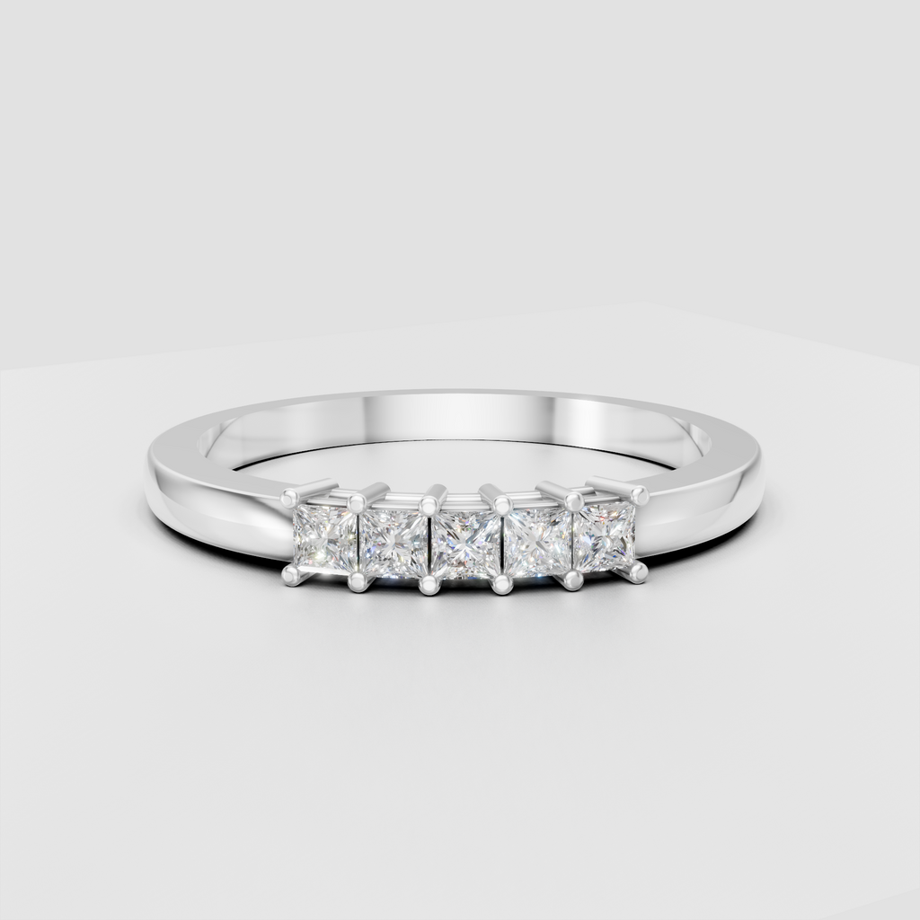 Princess cut diamond anniversary ring with shared-prong setting in yellow gold