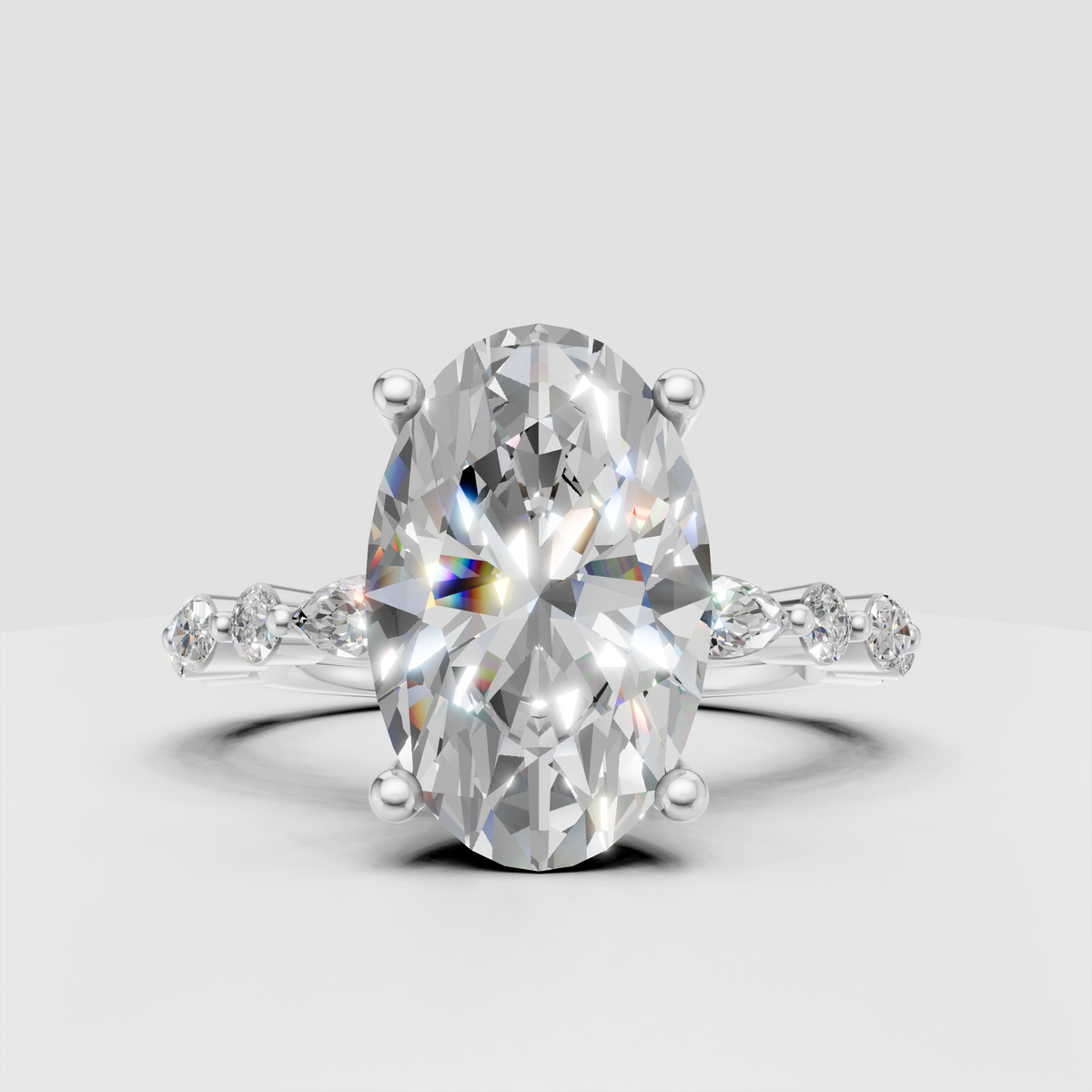 Oval diamond ring with marquise and round shoulder diamonds