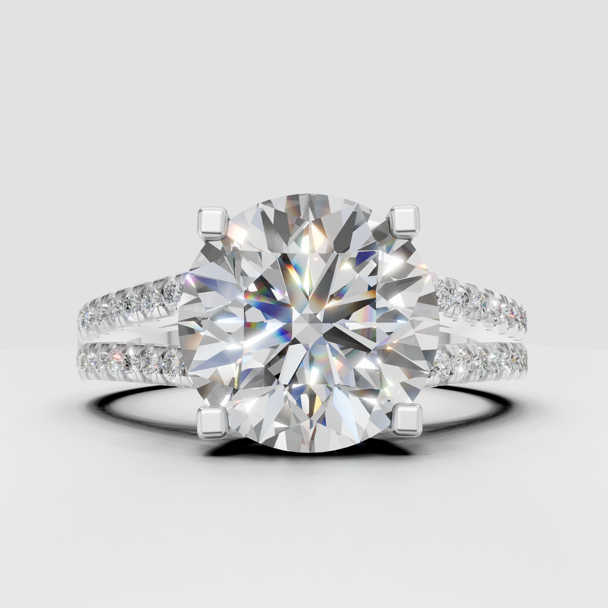 Round diamond anniversary ring with pavé split shank and basket setting