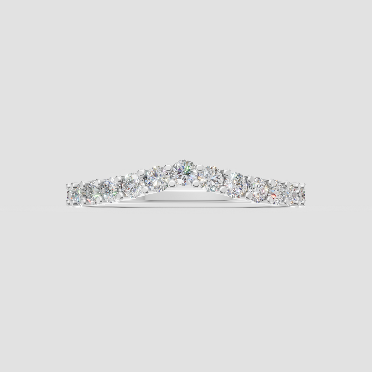 Curved round diamond band with polished gold shank and prong setting