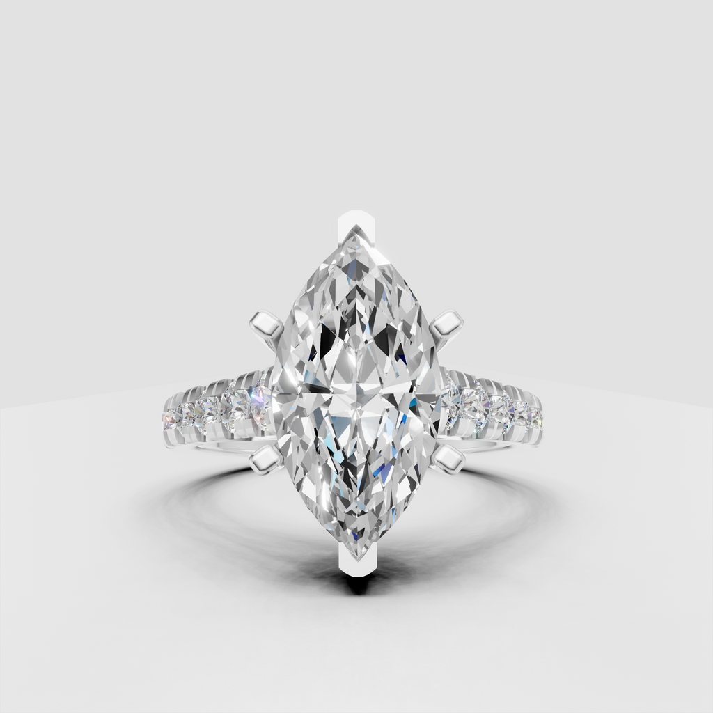 Marquise cut diamond ring with multiple prongs and polished yellow gold band