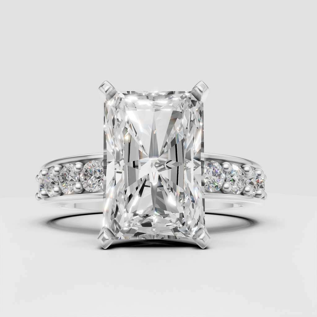 Yellow-gold radiant-cut engagement ring with channel-style side stones