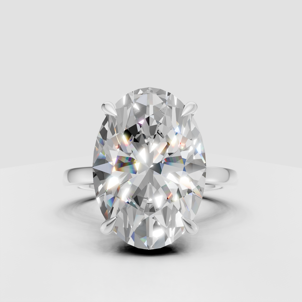 Oval diamond ring viewed from the front with polished gold band