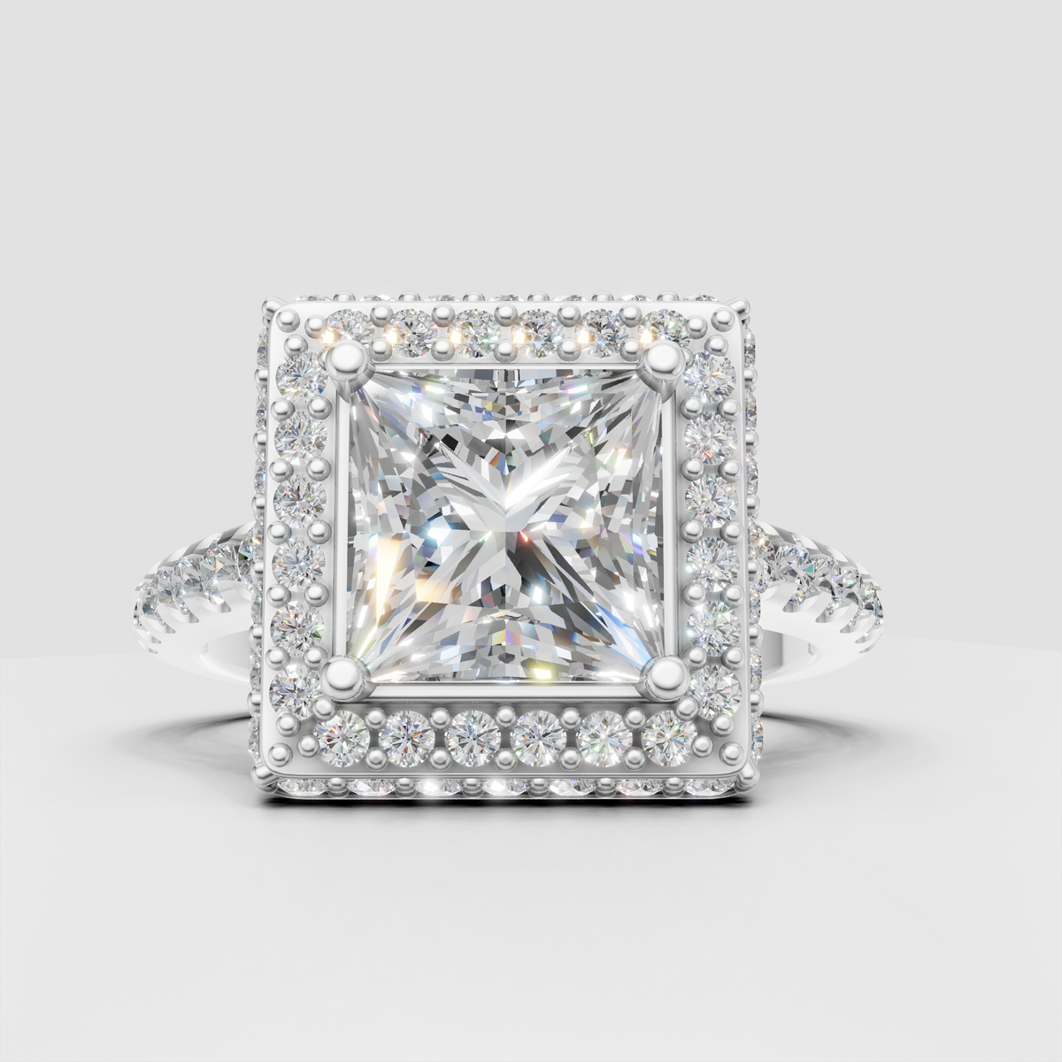 Princess cut diamond ring with detailed bead halo
