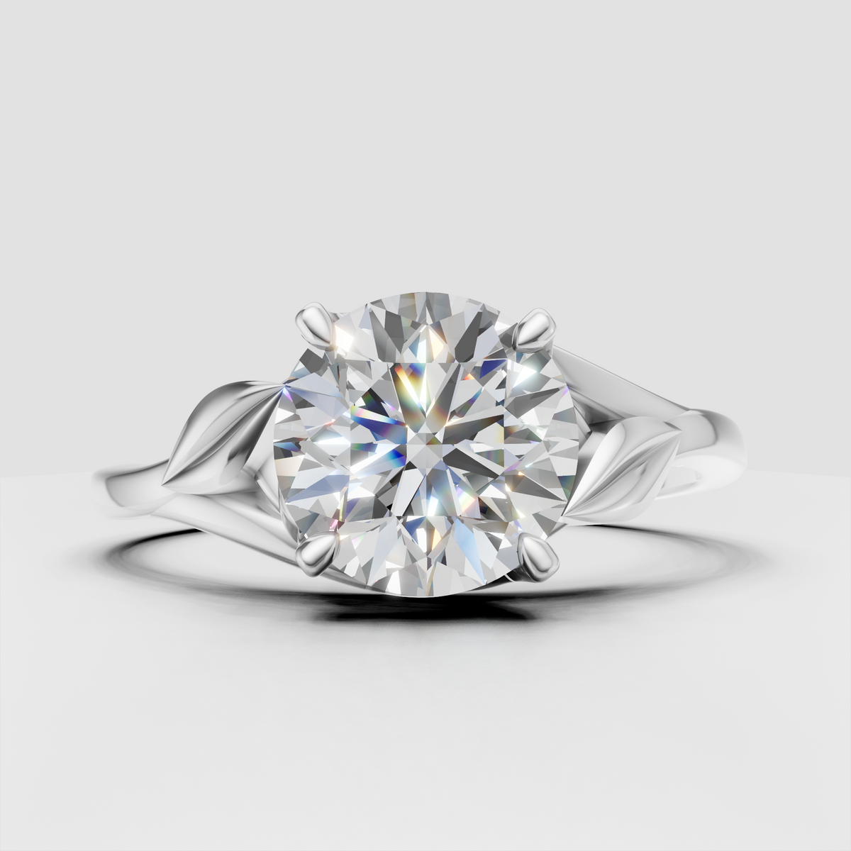 Leaf inspired split shank engagement ring with round center diamond