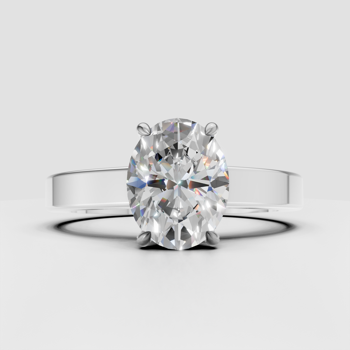 Yellow gold solitaire engagement ring with oval diamond