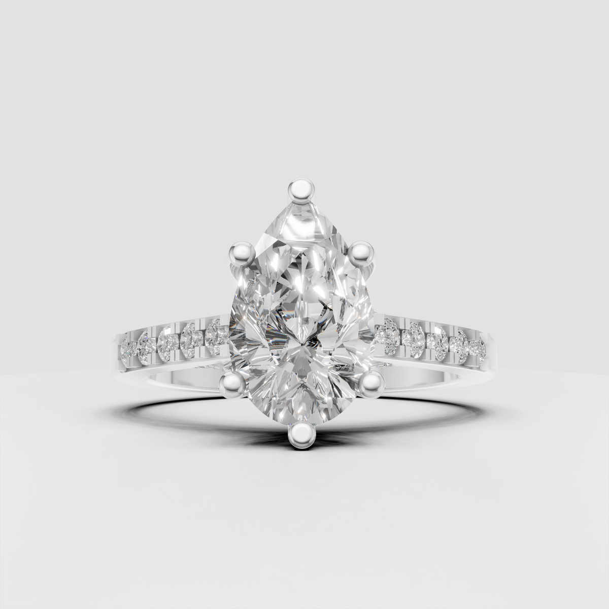 Pear cut diamond ring with sparkling round diamonds along the split shank