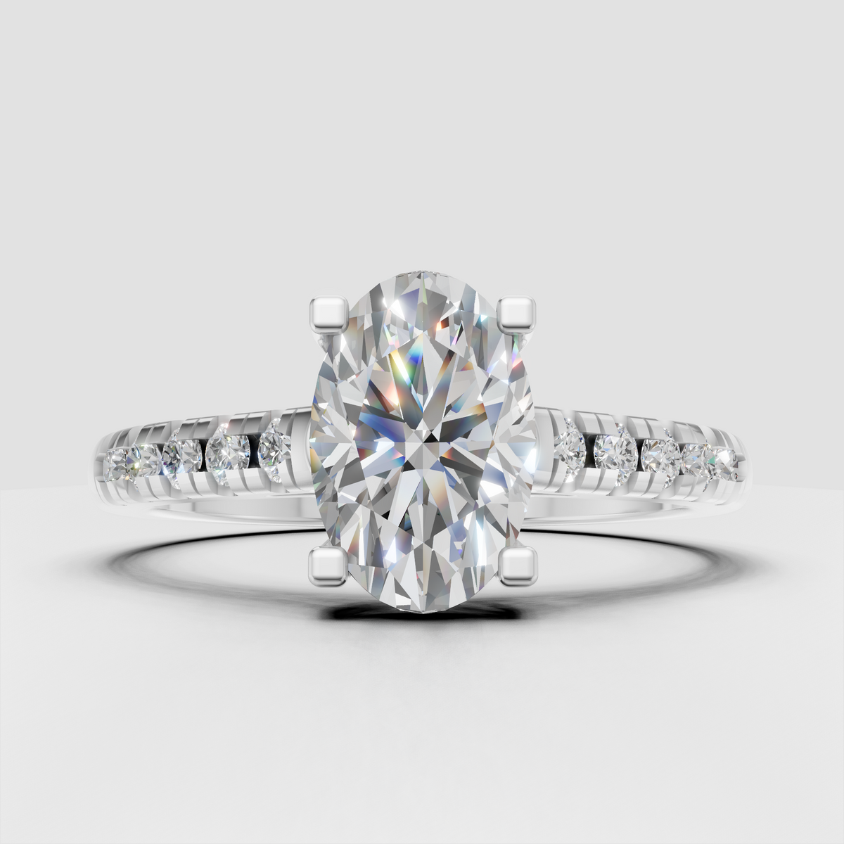 Oval solitaire ring featuring a delicate pavé diamond band