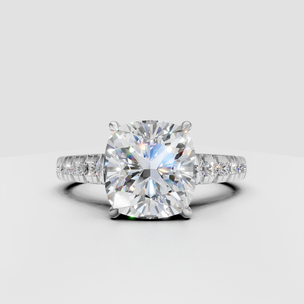 Cushion diamond ring featuring sparkling round side stones