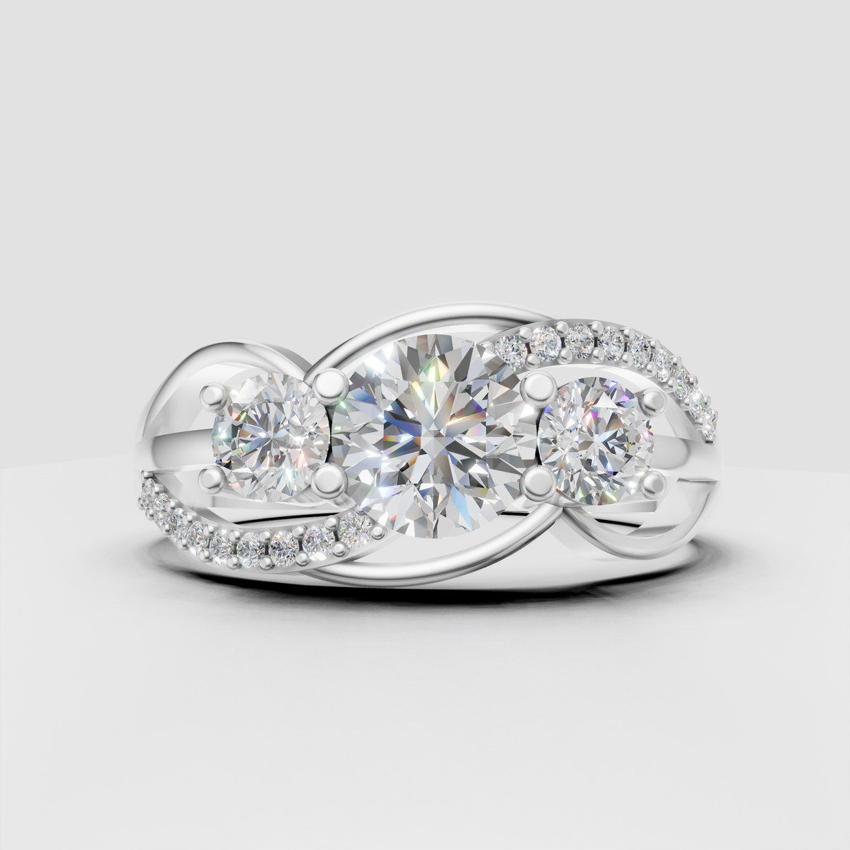 Round diamond engagement ring featuring three prominent stones