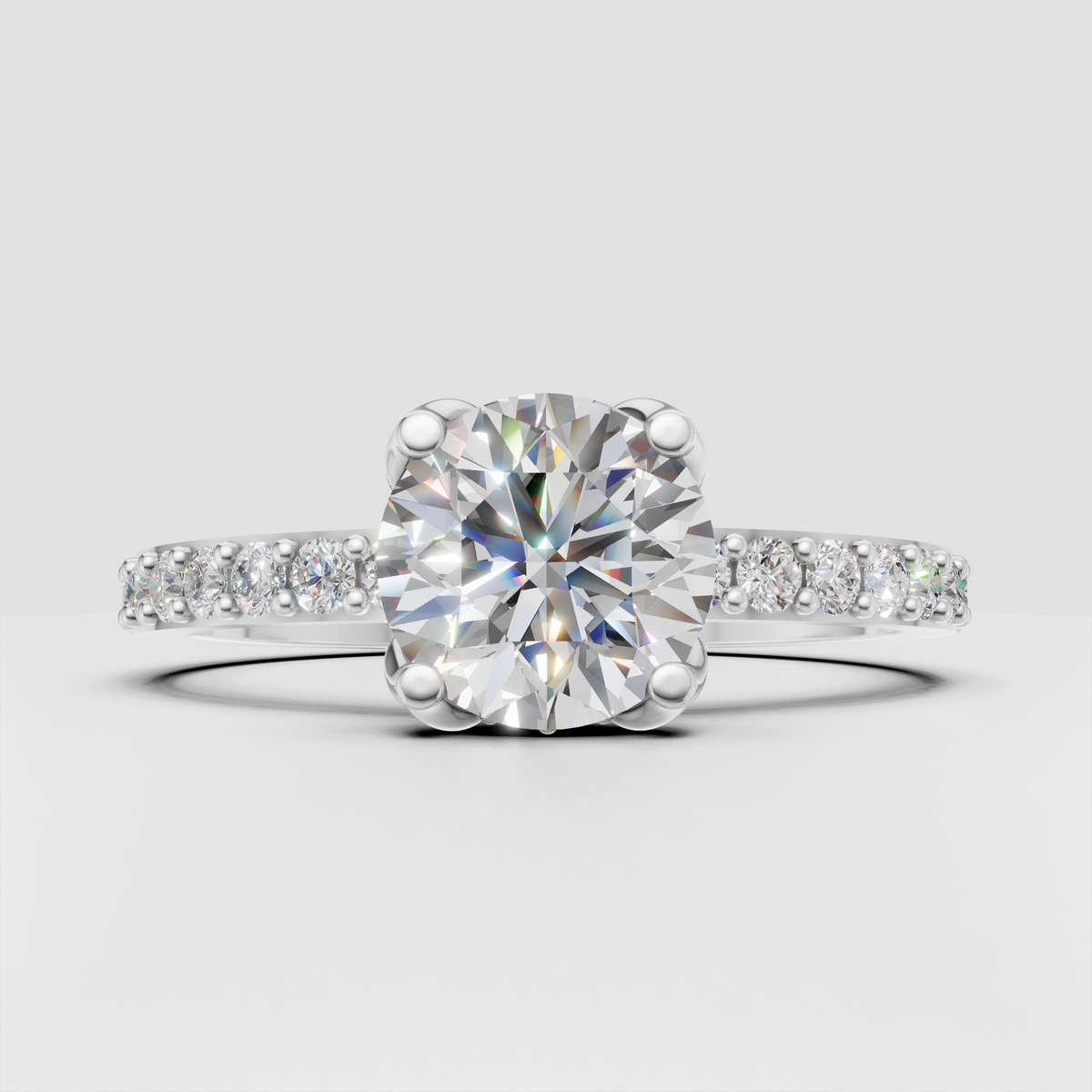 Round diamond engagement ring with sparkling shoulders
