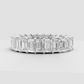 Yellow gold emerald cut diamond eternity ring with prongs
