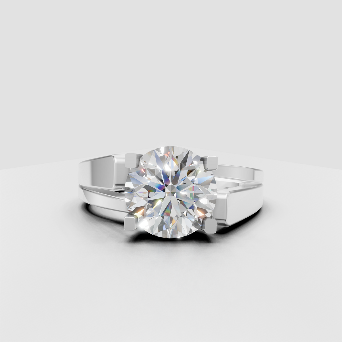 Modern round diamond engagement ring with crossover split shank design