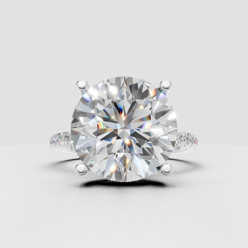 Yellow gold round cut diamond engagement ring with sparkling stones along the upper band.