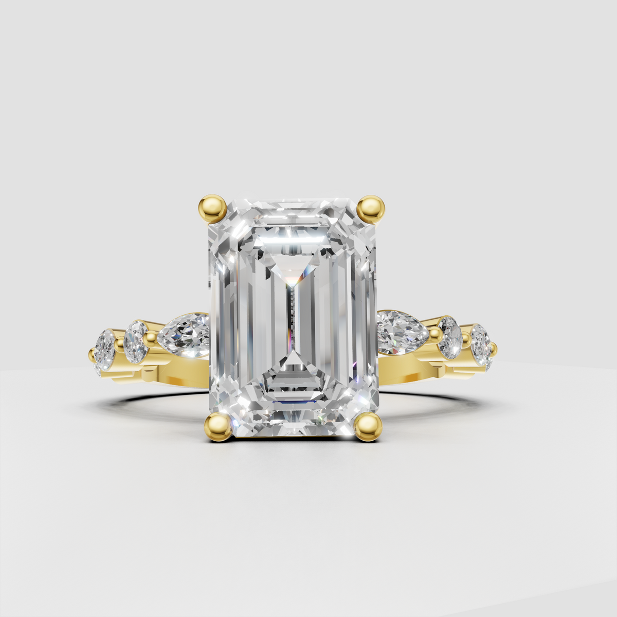Emerald cut diamond cathedral engagement ring in polished yellow gold